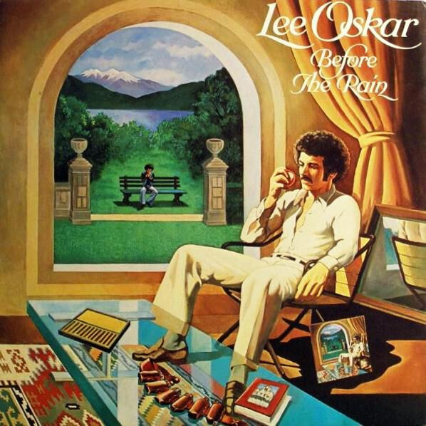 Album cover of Lee Oskar’s Before the Rain album - painting of a man sitting in front of a window eating an apple, while another man sitting outside on a bench playing harmonica in front a lake and mountain in the distance