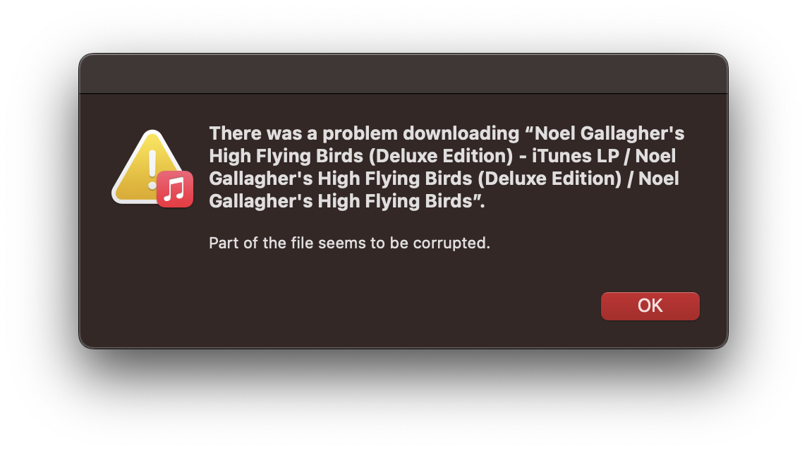 Screenshot of an Apple Music download error window that mentions “There was a problem downloading Noel Gallagher’s High Flying Birds (Ddeluxe Edition)” and also stating “Part of the file seems to be corrupted.”